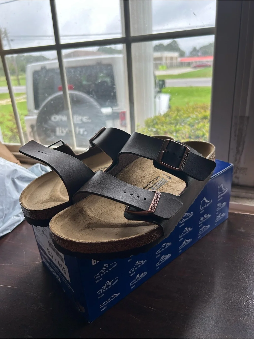 Birkenstock Arizona Two-Strap Sandals in Brown and Natural Cork